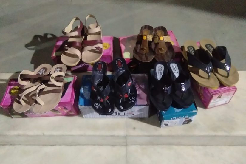 Footwear distribution by Jimmy Asija in Anath ashram